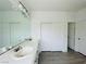 Bathroom featuring double sinks and a closet at 9821 Sedona Shrine Ave, Las Vegas, NV 89148