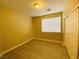 Neutral bedroom with closet and window that provides natural light and wood-style floors at 9821 Sedona Shrine Ave, Las Vegas, NV 89148