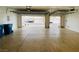 A spacious and clean two-car garage with natural lighting and ample space at 9821 Sedona Shrine Ave, Las Vegas, NV 89148