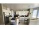 Modern kitchen with stainless steel appliances and a breakfast nook at 9821 Sedona Shrine Ave, Las Vegas, NV 89148