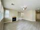 Bright living room with a fireplace and hardwood floors at 9821 Sedona Shrine Ave, Las Vegas, NV 89148