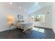 Bright bedroom features a king bed, a window with natural light and hardwood floors at 9937 Whalers Landing Ct, Las Vegas, NV 89117