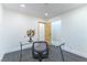Office space with hardwood style flooring, recessed lighting, and decoratively furnished with a glass desk at 9937 Whalers Landing Ct, Las Vegas, NV 89117