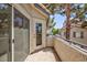 This condo balcony has a door entrance, neutral walls and a lovely view of the trees at , Las Vegas, NV 89120