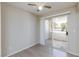 Cozy bedroom boasts a ceiling fan and a sliding glass door to the balcony at , Las Vegas, NV 89120