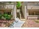 Exterior shot of building with stairs leading to upper units and well maintained landscaping at , Las Vegas, NV 89120