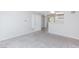 The living room features plush carpeting and neutral paint, offering a bright and airy atmosphere at , Las Vegas, NV 89120