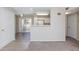 Open-concept living room and kitchen area with sliding glass doors to the patio at , Las Vegas, NV 89120