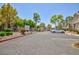 Exterior view of parking area showcasing landscaping and nearby residential buildings at , Las Vegas, NV 89120