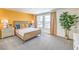 Bright bedroom featuring a comfortable bed, stylish decor, neutral walls, and large windows with ample natural light at , North Las Vegas, NV 89084