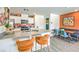 Bright and modern kitchen featuring a quartz countertop island, stainless steel appliances, and stylish bar stools at , North Las Vegas, NV 89084