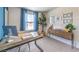 Bright office space with large window and a modern desk and shelving at , North Las Vegas, NV 89084