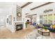 Inviting living room boasts a tiled fireplace, hardwood floors, and an open floor plan at 10404 Long Leaf Pl, Las Vegas, NV 89134