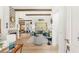 Bright living room featuring a decorative fireplace, hardwood floors, and modern furnishings at 10404 Long Leaf Pl, Las Vegas, NV 89134