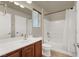 Cozy bathroom featuring a bathtub, shower and a sink with a vanity at 10845 Drake Ridge Ave, Las Vegas, NV 89166