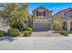 Charming two-story home with a brick driveway and a well-maintained front yard at 10845 Drake Ridge Ave, Las Vegas, NV 89166