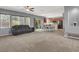 Open-concept living room, seamlessly blending with the kitchen and dining area, perfect for entertaining at 10845 Drake Ridge Ave, Las Vegas, NV 89166