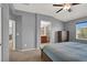 Spacious primary bedroom with an ensuite bathroom and large window at 10845 Drake Ridge Ave, Las Vegas, NV 89166