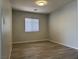 Bedroom with neutral walls, carpet flooring, and a window with blinds at 11029 Meadow Leaf Ave, Las Vegas, NV 89144