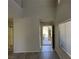 Bright entryway with hardwood floors and a view to the exterior at 11029 Meadow Leaf Ave, Las Vegas, NV 89144