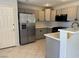 Bright kitchen featuring stainless steel appliances and spacious countertops at 11029 Meadow Leaf Ave, Las Vegas, NV 89144