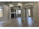 Open concept living space featuring new laminate floors and archways at 11029 Meadow Leaf Ave, Las Vegas, NV 89144