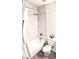 Updated bathroom features modern shower, toilet, and gray wood look flooring at 11074 Caramel Crest Ct, Las Vegas, NV 89135