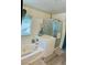 Bathroom features a jacuzzi tub and shower with a glass door at 11074 Caramel Crest Ct, Las Vegas, NV 89135