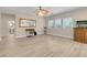 Spacious living area with wood floors, providing a modern and inviting atmosphere at 11074 Caramel Crest Ct, Las Vegas, NV 89135