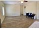Expansive main bedroom with plenty of space for furniture and wood-look flooring at 11074 Caramel Crest Ct, Las Vegas, NV 89135