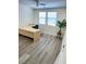 Office with desk, ceiling fan, large windows, and lots of natural light at 11074 Caramel Crest Ct, Las Vegas, NV 89135