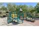 Community playground with colorful equipment, ideal for outdoor activities and recreation at 11074 Caramel Crest Ct, Las Vegas, NV 89135