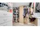 Spacious walk-in closet with custom shelving and ample storage for clothes and shoes at 11074 Caramel Crest Ct, Las Vegas, NV 89135
