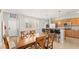 Dining room featuring bar seating and access to a well-equipped kitchen at 11274 Civita St, Las Vegas, NV 89141