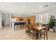 Dining space featuring kitchen bar and breakfast bar seating at 11274 Civita St, Las Vegas, NV 89141