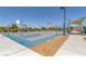 Outdoor basketball court with multiple hoops and shaded seating area at 1130 Blissful Plains Ave, North Las Vegas, NV 89086
