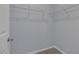 Walk-in closet with white wire shelving providing ample storage space at 1130 Blissful Plains Ave, North Las Vegas, NV 89086