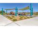 Community playground with modern equipment and sun shades at 1130 Blissful Plains Ave, North Las Vegas, NV 89086