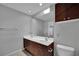 Contemporary bathroom boasts a double sink vanity and large mirror for a bright, open feel at 1190 E Carson Ave, Las Vegas, NV 89101
