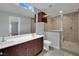 Modern bathroom with double vanity, tiled shower, and stylish fixtures offering a spa-like experience at 1190 E Carson Ave, Las Vegas, NV 89101