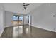 Bright bedroom features a ceiling fan and a window with a view at 1190 E Carson Ave, Las Vegas, NV 89101