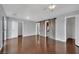 Large bedroom featuring polished floors, barn door to ensuite, two entries and neutral walls at 1190 E Carson Ave, Las Vegas, NV 89101