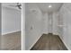 Walk-in closet with built-in shelving and laminate flooring at 1190 E Carson Ave, Las Vegas, NV 89101