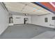 The garage has painted floors, an electric opener, water heater and stainless steel refrigerator at 1190 E Carson Ave, Las Vegas, NV 89101