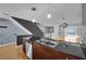 Modern kitchen featuring stainless steel appliances, granite countertops, and a double sink at 1190 E Carson Ave, Las Vegas, NV 89101