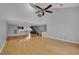 Open living area with hardwood floors, high ceilings, and a ceiling fan creates a spacious, airy feel at 1190 E Carson Ave, Las Vegas, NV 89101