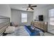 Neutral bedroom with a comfortable bed, dresser, and natural light creating a peaceful retreat at 1200 Mission View Ct, Henderson, NV 89002