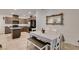 Dining area showcasing granite counters, stainless appliances and stylish cabinetry at 1200 Mission View Ct, Henderson, NV 89002