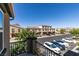 Community view of modern townhomes with desert landscaping and ample parking at 1200 Mission View Ct, Henderson, NV 89002