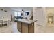 Open kitchen features granite counters, stainless appliances, and a view to other rooms at 1200 Mission View Ct, Henderson, NV 89002